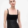 Abito con frange e paillettes Abito con frange e paillettes