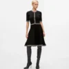 Abito in maglia con dettagli bouclé Abito in maglia con dettagli bouclé