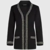 Cardigan con dettagli bouclé Cardigan con dettagli bouclé