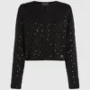 Cardigan con paillettes Cardigan con paillettes