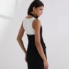 GILET CON SCOLLO ALL’ALLACCIATURA GILET CON SCOLLO ALL’ALLACCIATURA