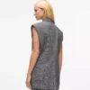 Gilet in tweed con revers in paillettes Gilet in tweed con revers in paillettes