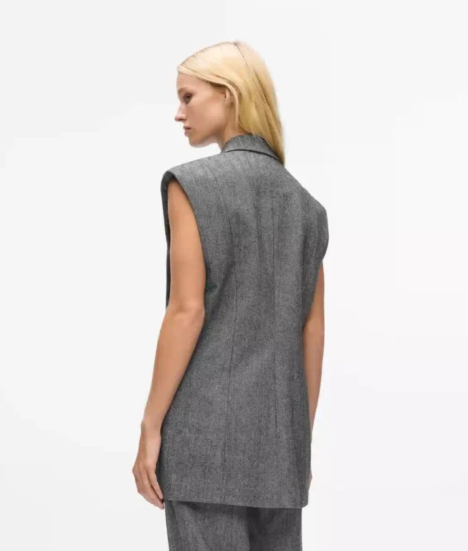 Gilet in tweed con revers in paillettes Gilet in tweed con revers in paillettes