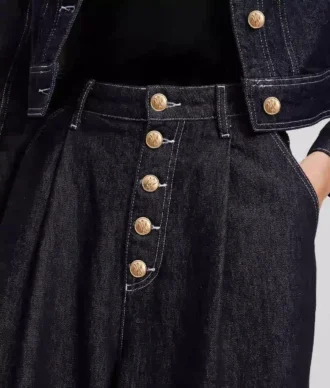 JEANS A GAMBA LARGA CON CHIUSURA CON BOTTONI