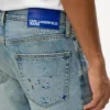 Jeans affusolati con spruzzi di vernice