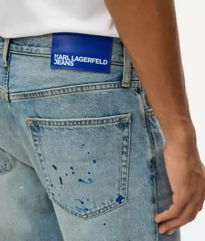 Jeans affusolati con spruzzi di vernice
