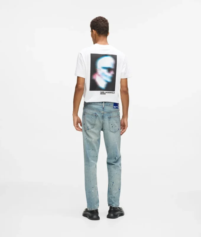Jeans affusolati con spruzzi di vernice