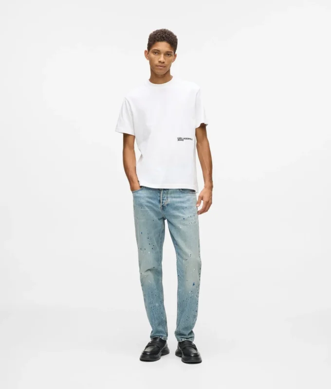 Jeans affusolati con spruzzi di vernice