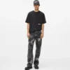 Jeans comodi con effetto verniciato Jeans comodi con effetto verniciato