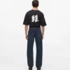 Jeans con monogramma su tutta la superficie Jeans con monogramma su tutta la superficie