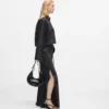 Jeans dritti a vita alta con spacchi sulle gambe