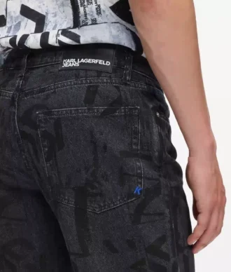 Jeans dritti con monogramma su tutta la superficie Jeans dritti con monogramma su tutta la superficie