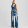 JEANS RELAXED CON FRANGE