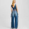 JEANS RELAXED CON FRANGE