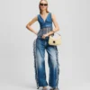 JEANS RELAXED CON FRANGE