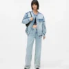 Jeans rilassati a vita media con cuciture Jeans rilassati a vita media con cuciture