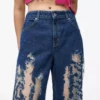 Jeans rilassati a vita media con effetto consumato Jeans rilassati a vita media con effetto consumato