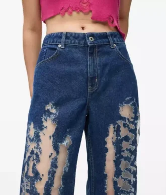 Jeans rilassati a vita media con effetto consumato Jeans rilassati a vita media con effetto consumato