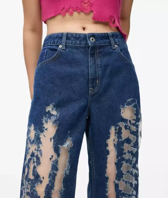 Jeans rilassati a vita media con effetto consumato Jeans rilassati a vita media con effetto consumato