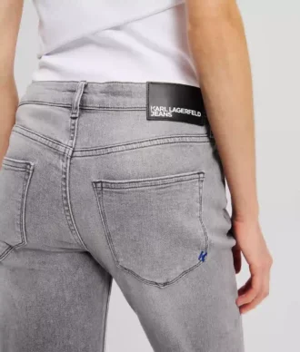 JEANS SLIM A VITA MEDIA CON ORLO SPACCATO