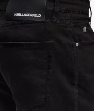 Jeans slim con dettagli metallici