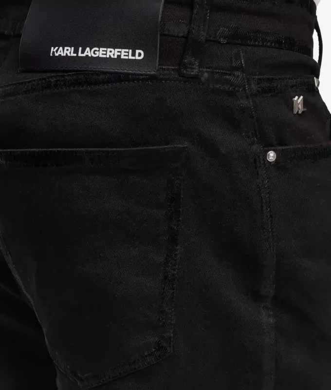 Jeans slim con dettagli metallici