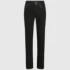 Jeans slim con dettagli metallici