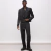 KL Studio pantaloni con dettagli in raso