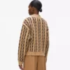 Maglione con collo alto e lavorazione a trecce