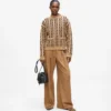 Maglione con collo alto e lavorazione a trecce