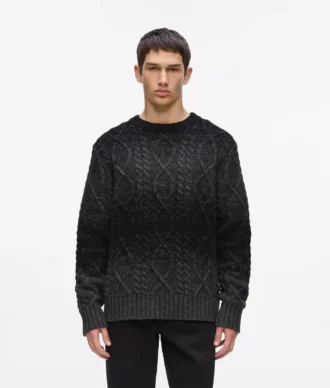 Maglione lavorato a trecce