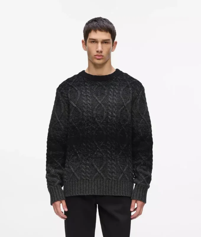 Maglione lavorato a trecce