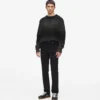 Maglione lavorato a trecce