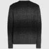 Maglione lavorato a trecce