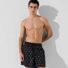 MORBIDI SHORTS DA SURF CON STAMPA ALL-OVER IKON