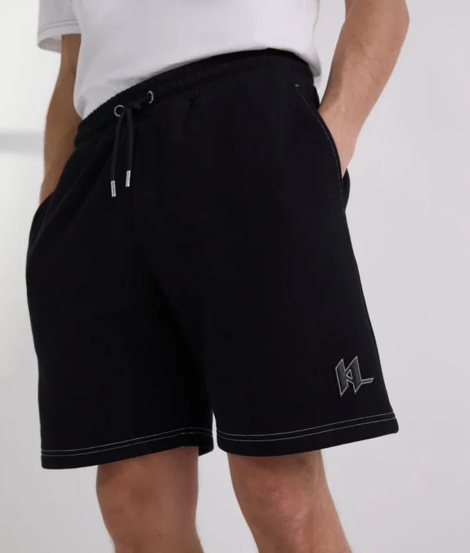 PANTALONCINI CON CUCITURE A CONTRASTO PANTALONCINI CON CUCITURE A CONTRASTO