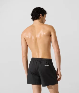 Pantaloncini da surf con spilla Monogram