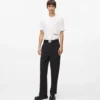 Pantaloni con bordino tono su tono
