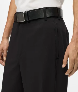Pantaloni con bordino tono su tono
