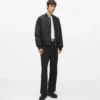 Pantaloni con bordino tono su tono
