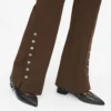 Pantaloni con bottoni a pressione