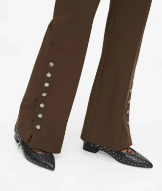 Pantaloni con bottoni a pressione Pantaloni con bottoni a pressione