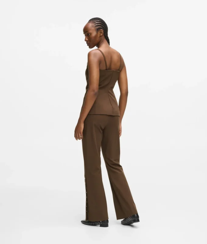 Pantaloni con bottoni a pressione