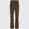 Pantaloni con bottoni a pressione