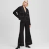 PANTALONI CON CUCITURE A CONTRASTO