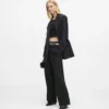 Pantaloni con doppia cintura Pantaloni con doppia cintura