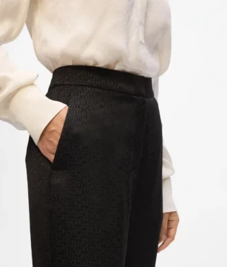 Pantaloni con stampa all-over