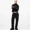 Pantaloni della tuta con monogramma borchiato Pantaloni della tuta con monogramma borchiato