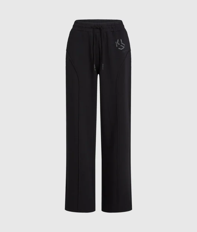 Pantaloni della tuta con monogramma borchiato Pantaloni della tuta con monogramma borchiato