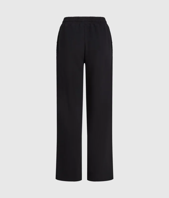 Pantaloni della tuta con monogramma borchiato Pantaloni della tuta con monogramma borchiato